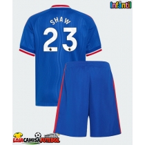 Camisa de Futebol Manchester United Luke Shaw #23 Equipamento Secundário Infantil 2026-27 Manga Curta (+ Calças curtas)